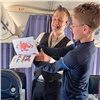 Авиакомпания NordStar в полете поздравила юных пассажиров с Днем защиты детей